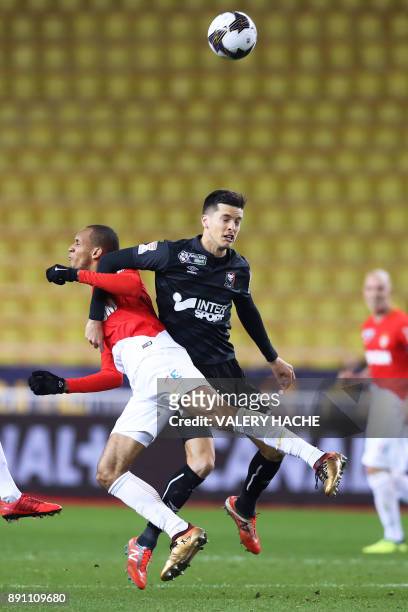 Monaco's Brazilian defender Fabinho vies with Caen's Belgian midfielder Stef Peeters during the French League Cup round of 16 football match between...