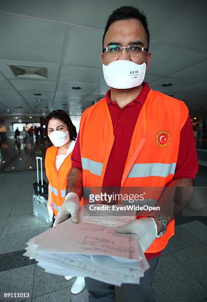 Health control and screening procedure at Istanbul Atatuerk Airport on May 20, 2009 in Istanbul, Turkey.