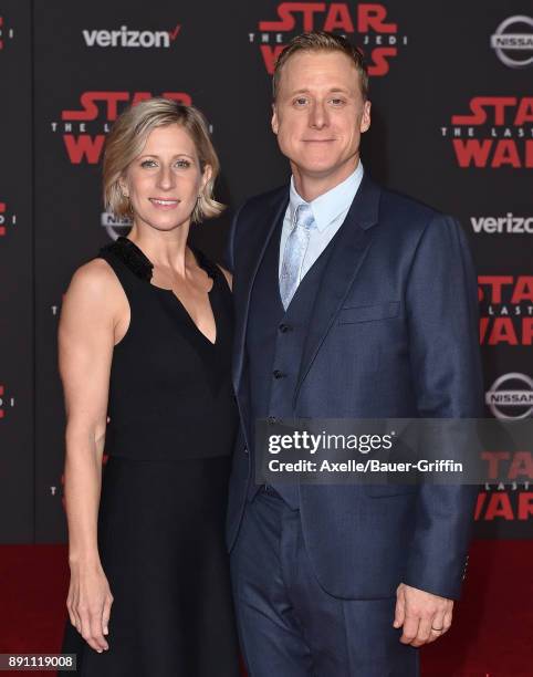 Actor Alan Tudyk and Charissa Barton attend the Los Angeles premiere of 'Star Wars: The Last Jedi' at The Shrine Auditorium on December 9, 2017 in...