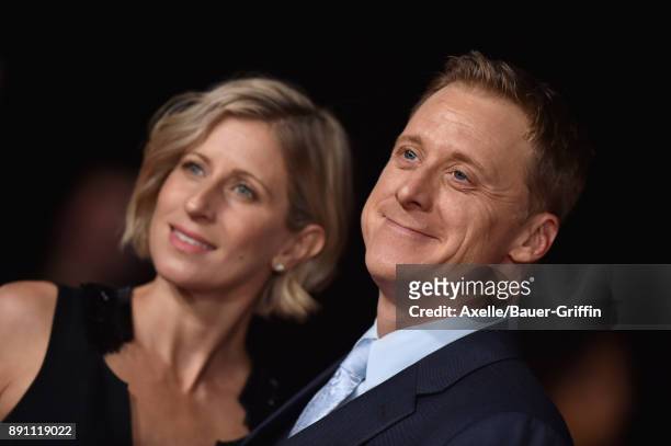 Actor Alan Tudyk and Charissa Barton attend the Los Angeles premiere of 'Star Wars: The Last Jedi' at The Shrine Auditorium on December 9, 2017 in...