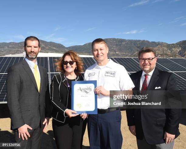 Kevin Rabinovitch, Global VP of Sustainability for Mars, Assemblymember Eloise Gomez Reyes, Stuart Harness, Plant Manager for Mars Petcare's San...