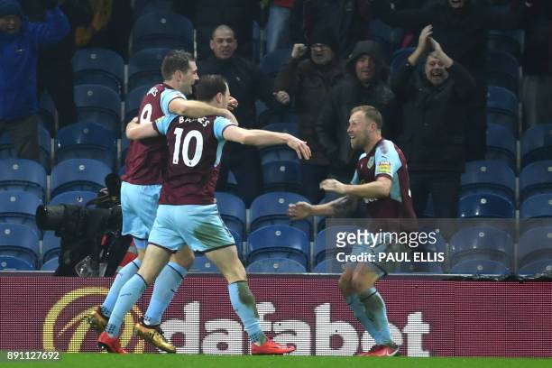 Burnley's English striker Ashley Barnes celebrates after scoring during the English Premier League football match between Burnley and Stoke at Turf...