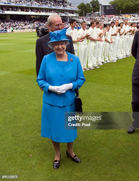 Queen Elizabeth II meets the England and Australian players during day two of the npower 2nd Ashes Test Match between England and Australia at Lord's...