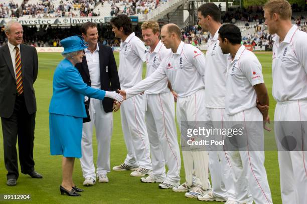 Queen Elizabeth II is introduced to the England team and shakes hands with Matthew Prior during day two of the npower 2nd Ashes Test Match between...