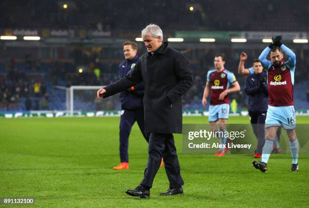 Mark Hughes, Manager of Stoke City looks dejected after the Premier League match between Burnley and Stoke City at Turf Moor on December 12, 2017 in...