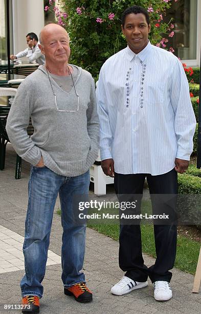 Director Tony Scott and actor Denzel Washington pose for a photocall presenting their movie 'The Taking of Pelham 123' at Hotel Le Bristol on July...