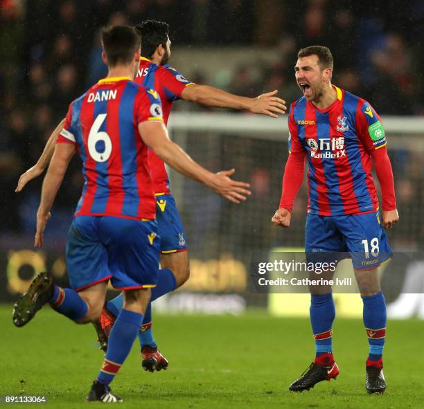 James McArthur of Crystal Palace celebrates after scoring his sides second goal with teammates during the Premier League match between Crystal Palace...