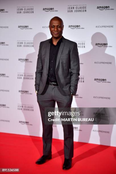 French TV host Harry Roselmack poses during a photocall for the world launch of the Amazon Prime series "Jean-Claude Van Johnson" on December 12 at...