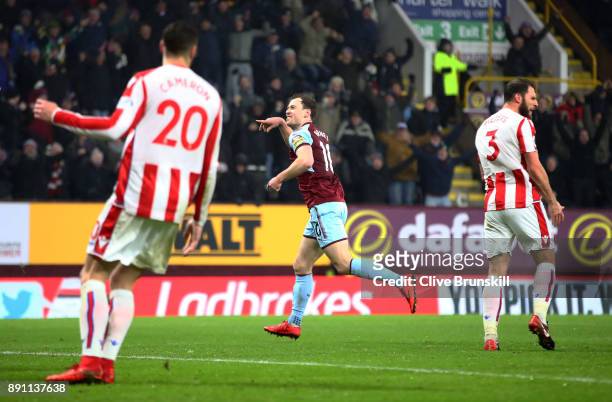 Ashley Barnes of Burnley celebrates scoring the first Burnley goal during the Premier League match between Burnley and Stoke City at Turf Moor on...