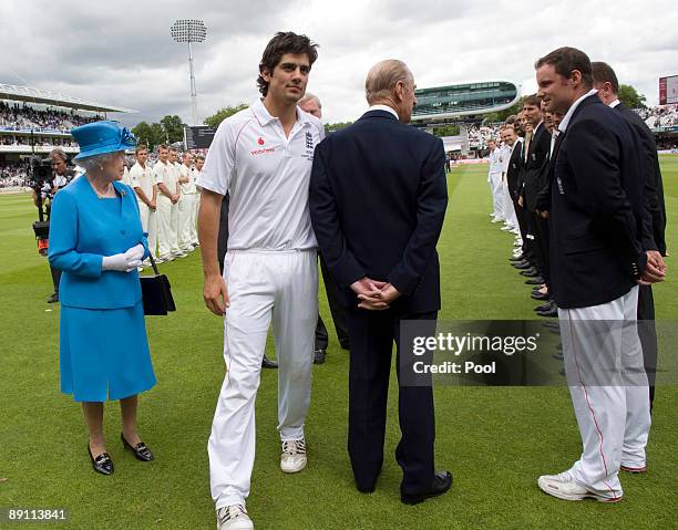 Alastair Cook walks past Prince Philip, Duke of Edinburgh as Queen Elizabeth II meets the players during day two of the npower 2nd Ashes Test Match...