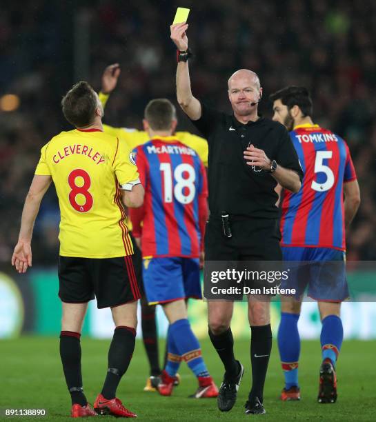 Tom Cleverley of Watford is shown a second yellow card by referee Lee Mason during the Premier League match between Crystal Palace and Watford at...
