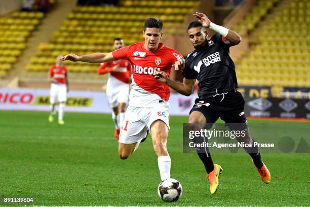 Guido Carrillo of Monaco and Alexander Djiku of Caen during the french League Cup match, Round of 16, between Monaco and Caen on December 12, 2017 in...