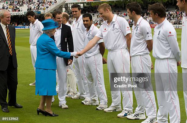 Queen Elizabeth II is introduced to the England team and shakes hands with Andrew Flintoff during day two of the npower 2nd Ashes Test Match between...