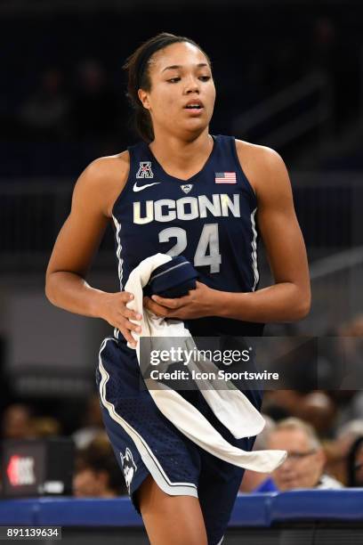 Connecticut Huskies forward Napheesa Collier exits the court during a game between the Connecticut Huskies and the DePaul Blue Demons on December 8...