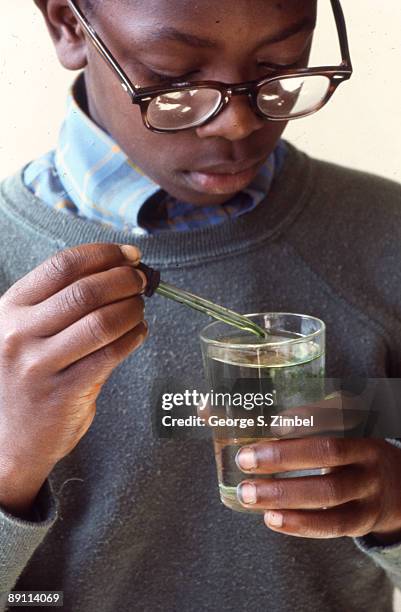 Children Using Liquid Dropper 155 Eye Drops Kids Stock Photos, High-Res Pictures, and Images - Getty ...