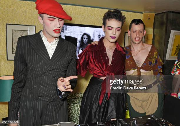 Charles Jeffrey, Harry Charlesworth and Scotty Sussman attend the Love x Chaos x Poppy Delevingne x Moet Christmas Party at George on December 12,...