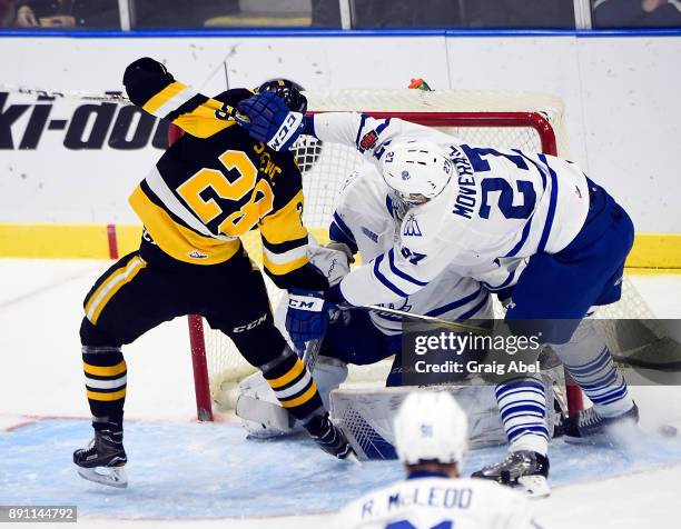 Marian Studenic of the Mississauga Steelheads gets pulled down by Jacob Moverare of the Mississauga Steelheads during game action on December 10,...