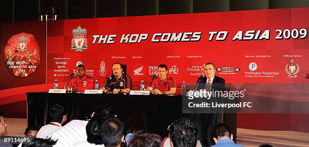 Liverpool's Ryan Babel, manager Rafael Benitez, Jamie Carragher, and Ian Ayre talk to the media during a press conference at the Grand Hyatt, Erawan...