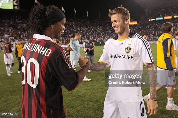 David Beckham of the Los Angeles Galaxy and Ronaldinho of AC Milan shake hands following the international friendly at The Home Depot Center on July...