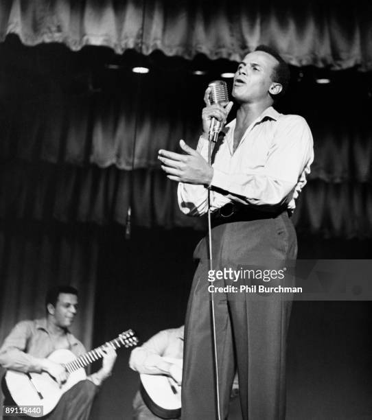 Jamaican-American singer, actor and civil rights activist Harry Belafonte performing at the Riviera hotel in Las Vegas, 1957.