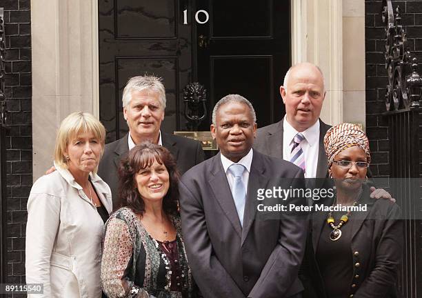 Family members of knife crime victims Sally Knox, Colin Knox, Margaret Mizen,Richard Taylor, Barry Mizen and Grace Idowu stand in Downing Street on...