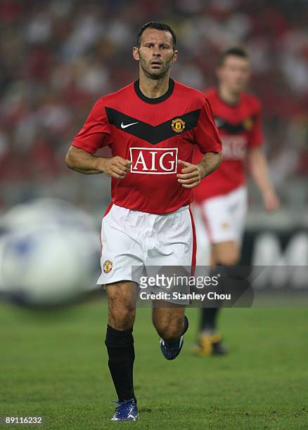 Ryan Giggs of Manchester United in action during the pre-season friendly match between Manchester United and Malaysia XI at Bukit Jalil National...