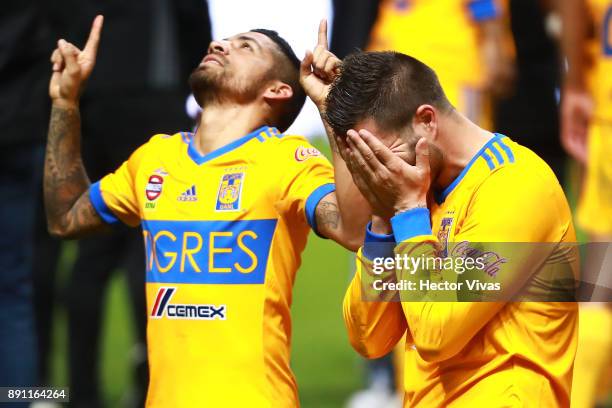 Javier Aquino and Andre Pierre Gignac of Tigres celebrate after winning the second leg of the Torneo Apertura 2017 Liga MX final between Monterrey...