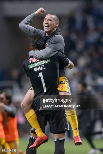 Jesus Dueñas of Tigres celebrates with teammate Nahuel Guzman after winning the second leg of the Torneo Apertura 2017 Liga MX final between...