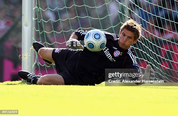 Hans-Joerg Butt of Bayern Muenchen challenge for the ball during a training session at the Anton Mall stadium at day three of the FC Bayern Muenchen...