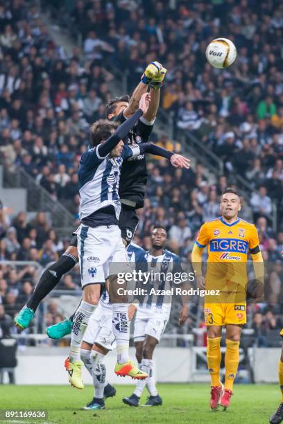 Nahuel Guzman, goalkeeper of Tigres, deflects the ball during the second leg of the Torneo Apertura 2017 Liga MX final between Monterrey and Tigres...