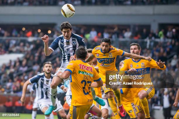 Stefan Medina of Monterrey heads the ball during the second leg of the Torneo Apertura 2017 Liga MX final between Monterrey and Tigres UANL at BBVA...