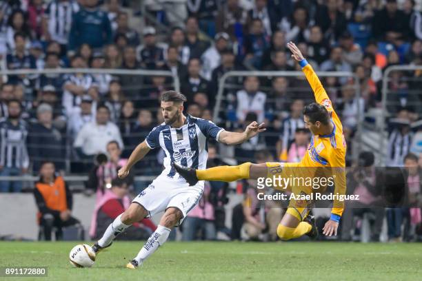 Nicolas Sanchez of Monterrey fights for the ball with Ismael Sosa of Tigres during the second leg of the Torneo Apertura 2017 Liga MX final between...