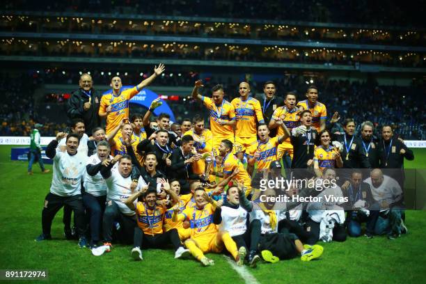 Team members of Tigres pose for a group photo after winning the second leg of the Torneo Apertura 2017 Liga MX final between Monterrey and Tigres...
