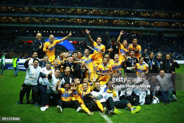 Team members of Tigres pose for a group photo after winning the second leg of the Torneo Apertura 2017 Liga MX final between Monterrey and Tigres...