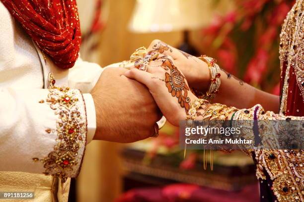 holding hands - married stock pictures, royalty-free photos & images