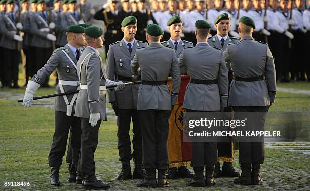 Soldiers of the 3rd and 7th "Wachbataillon" of the German Bundeswehr are sworn in during a ceremony for new recruits in front of the Reichstag...