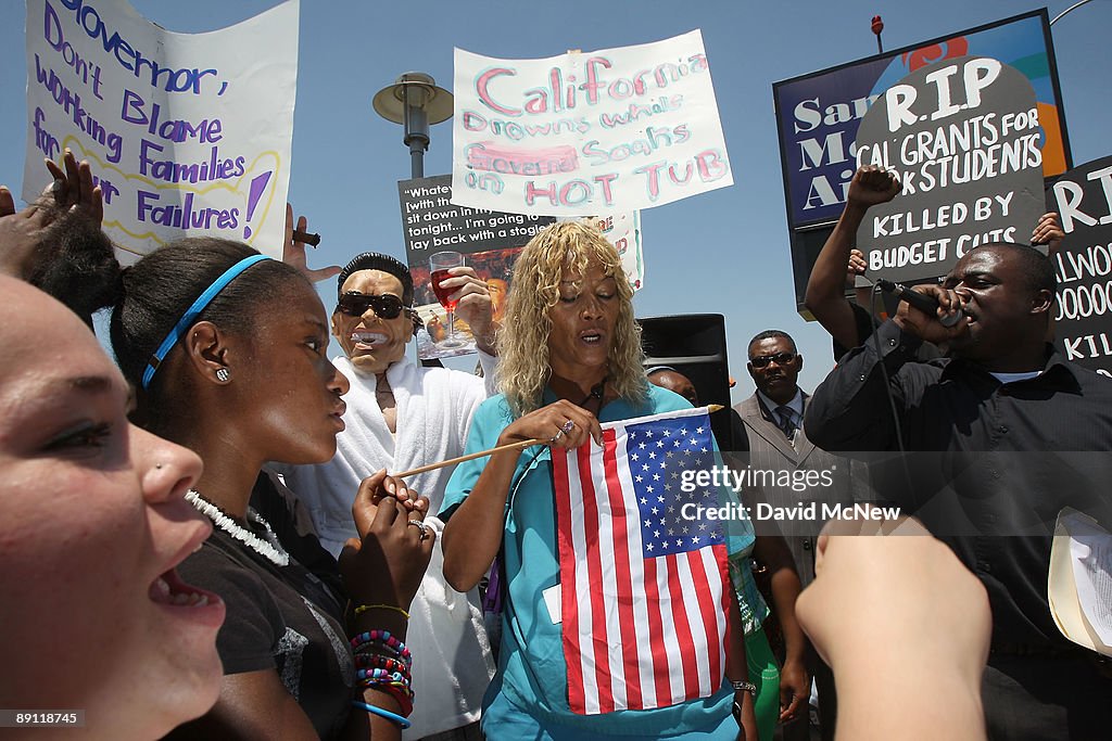 Activists Gather At Airport To Protest Against Gov. Arnold Schwarzenegger