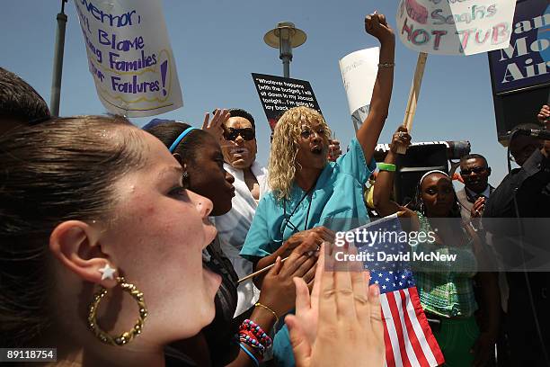 Activists rally near the Santa Monica Airport, where California Gov. Arnold Schwarzenegger commutes between his home in Brentwood and Sacramento, to...