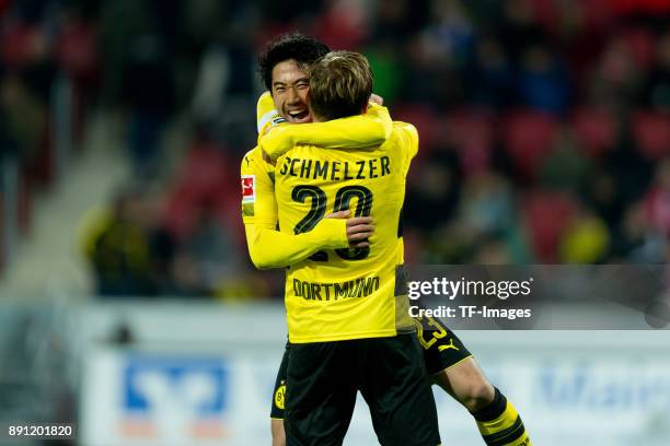 Shinji Kagawa of Dortmund celebrates after scoring his team`s second goal with Marcel Schmelzer of Dortmund during the Bundesliga match between 1....