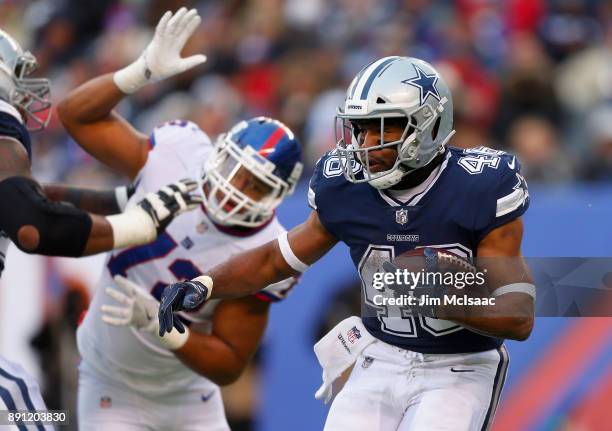 Alfred Morris of the Dallas Cowboys in action against the New York Giants on December 10, 2017 at MetLife Stadium in East Rutherford, New Jersey. The...