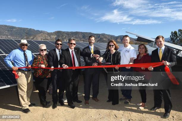 Global VP of Sustainability for Mars Kevin Rabinovitch and Mars Petcare San Bernardino Plant Manger Stuart Harness 'flip the switch' on the third...