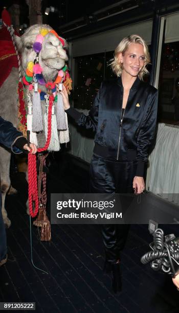 Poppy Delevingne attends the Love x Chaos x Poppy Delevingne x Moet Christmas Party at George on December 12, 2017 in London, England.