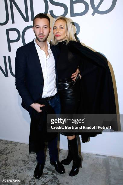 Boniface Reiffers and Melonie Foster Hennessy attend the "Solve Sundsbo pour Numero" Exhibition Opening at Studio des Acacias on December 12, 2017 in...