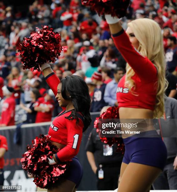 Simone Biles serves as an honorary cheerleader and enters the stadium before the game between the Houston Texans and the San Francisco 49ers at NRG...