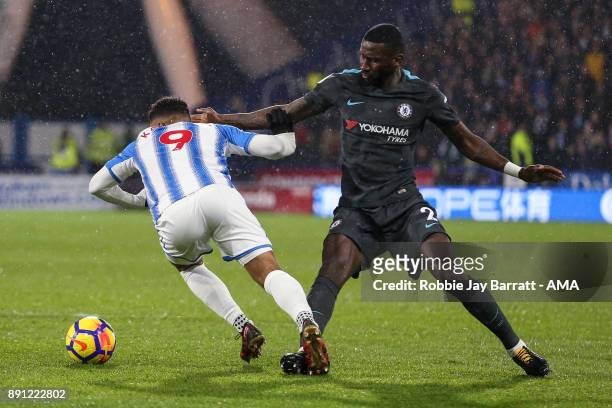 Elias Kachunga of Huddersfield Town and Antonio Rudiger of Chelsea during the Premier League match between Huddersfield Town and Chelsea at John...