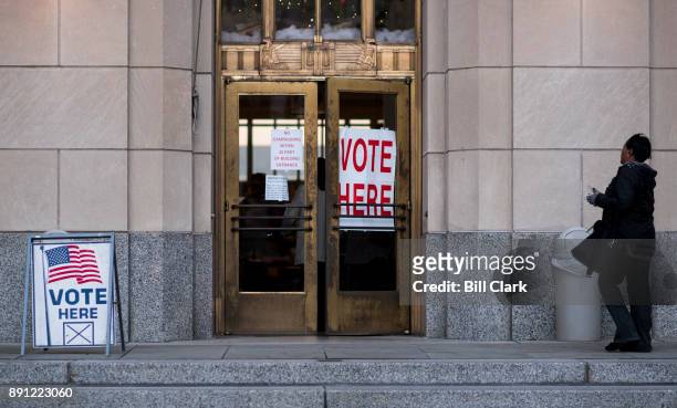 Voter enters the polling station at the Jefferson County Courthouse in Birmingham, Ala., on Tuesday, Dec. 12 to vote in the special election to fill...