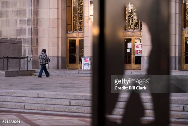 Voter enters the polling station at the Jefferson County Courthouse in Birmingham, Ala., on Tuesday, Dec. 12 to vote in the special election to fill...