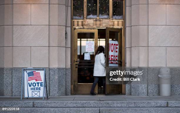 Voter enters the polling station at the Jefferson County Courthouse in Birmingham, Ala., on Tuesday, Dec. 12 to vote in the special election to fill...