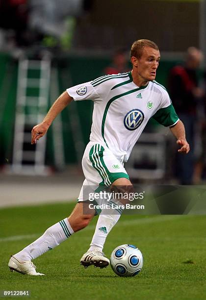 Thomas Kahlenberg of Wolfsburg runs with the ball during the Volkswagen Supercup final match between VfL Wolfsburg and SV Werder Bremen at Volkswagen...