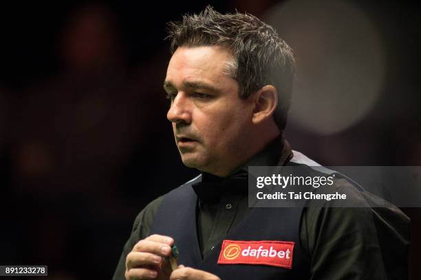 Alan McManus of Scotland reacts during his first round match against Matthew Selt of England on day two of the 2017 Scottish Open at Emirates Arena...